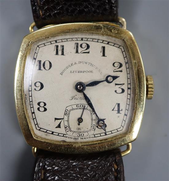 A gentlemans late 1920s 18ct gold manual wind wrist watch, retailed by Boodle & Dunthorne, on associated strap.